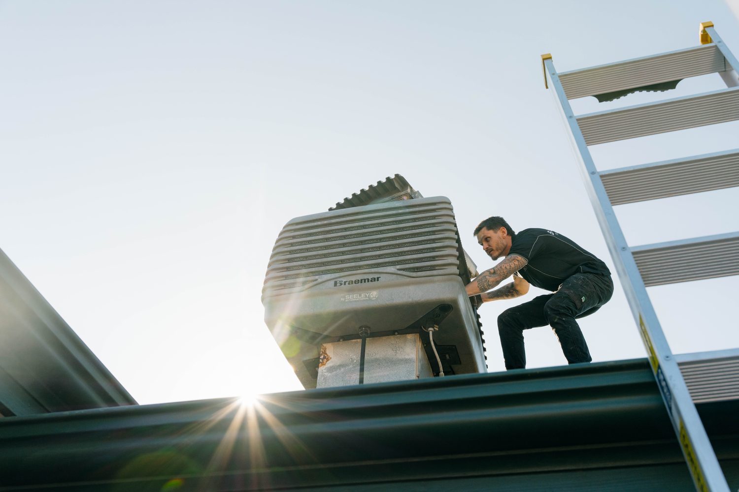 Evaporative cooling unit service on the roof